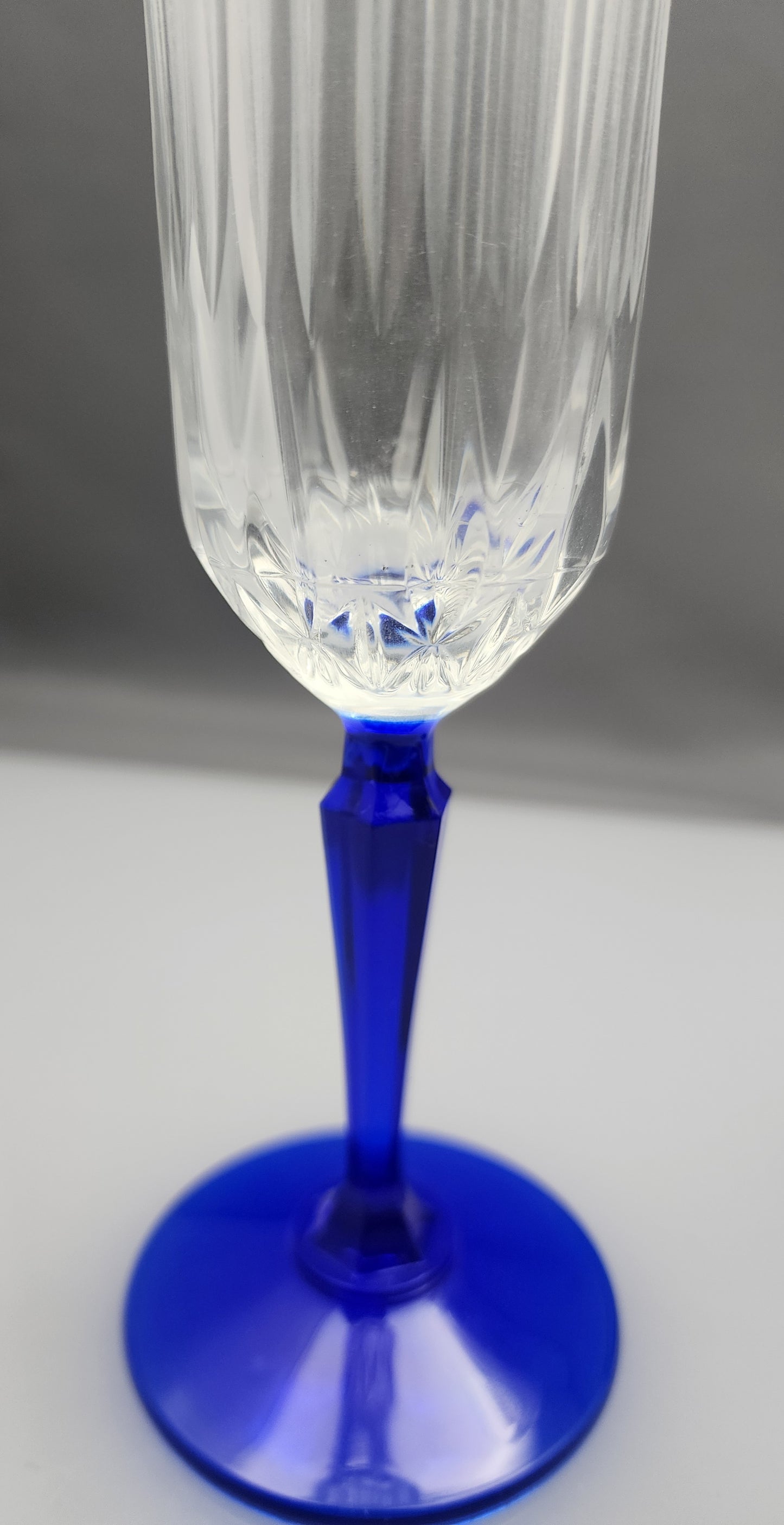 Pair Cut glass flutes blue stem Hand cut