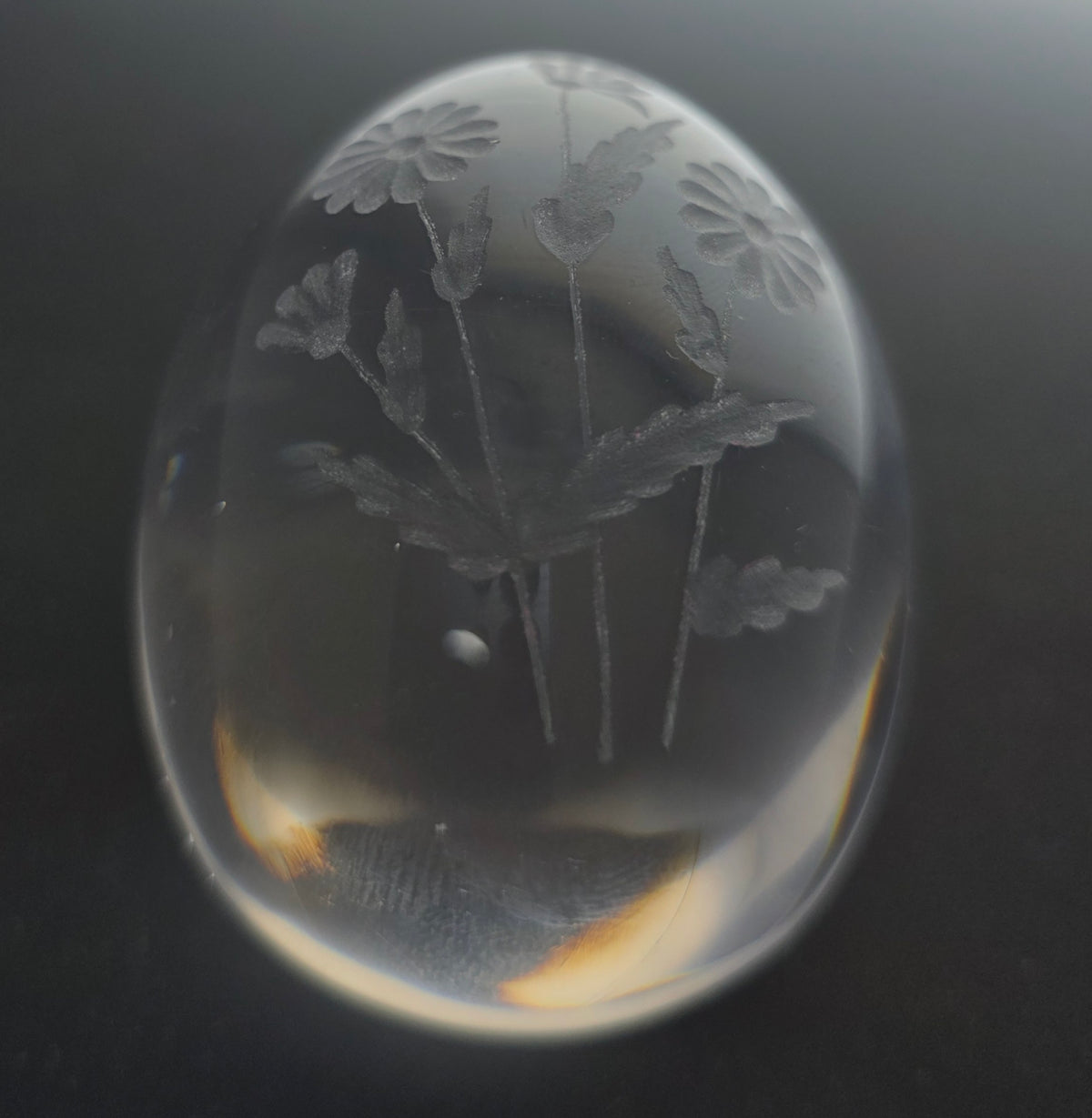 Glass egg paperweight with copper wheel engraved flowers