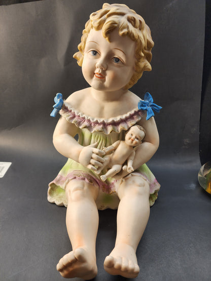 Large hand painted bisque Porcelain piano doll