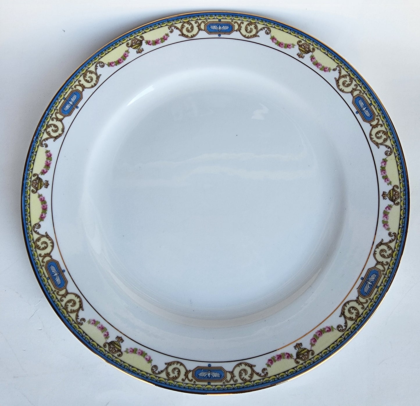 4 Noritake china  dinner pates