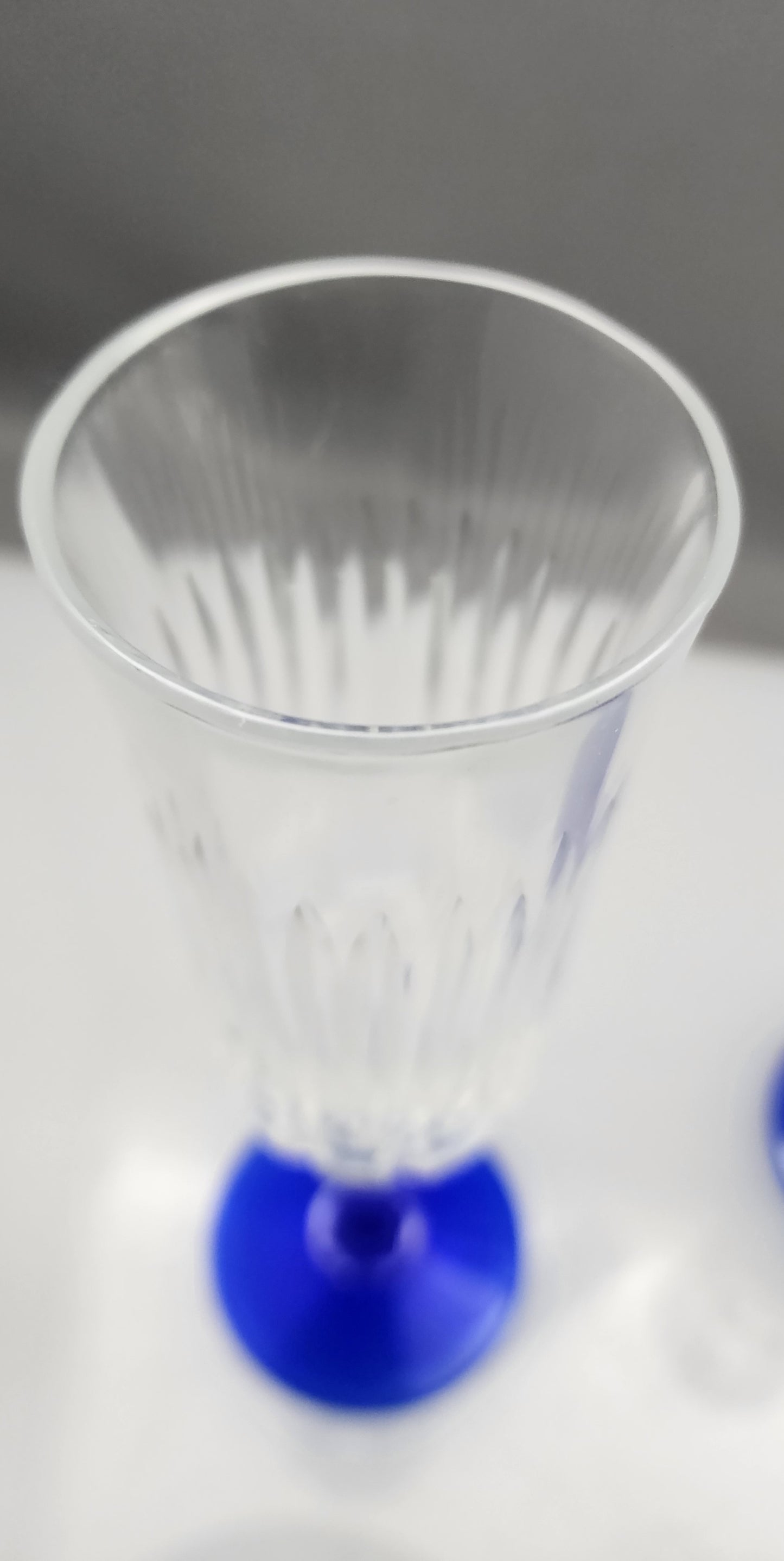 Pair Cut glass flutes blue stem Hand cut