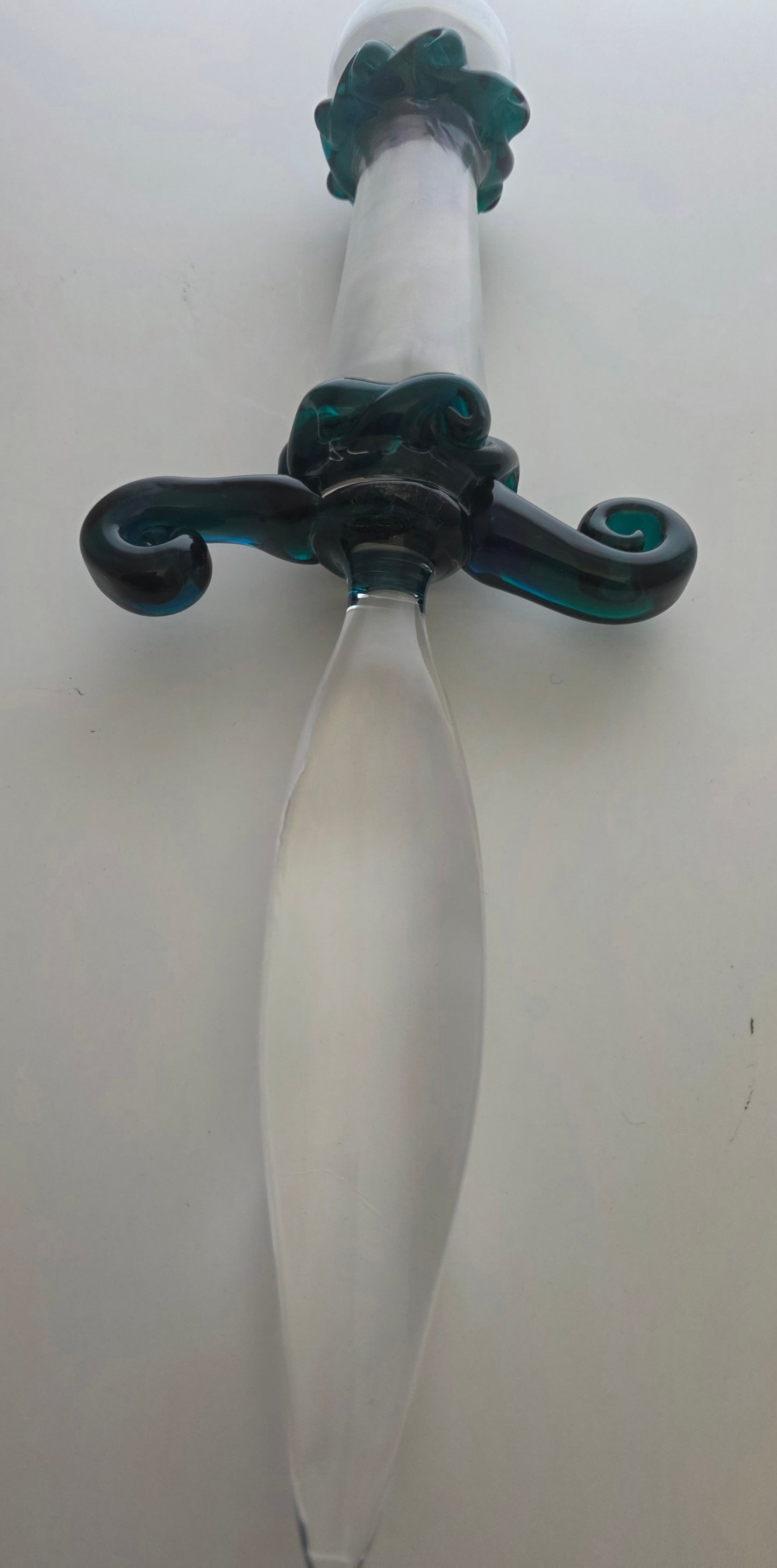 L.E Smith green and white Glass hand made art dagger.
.