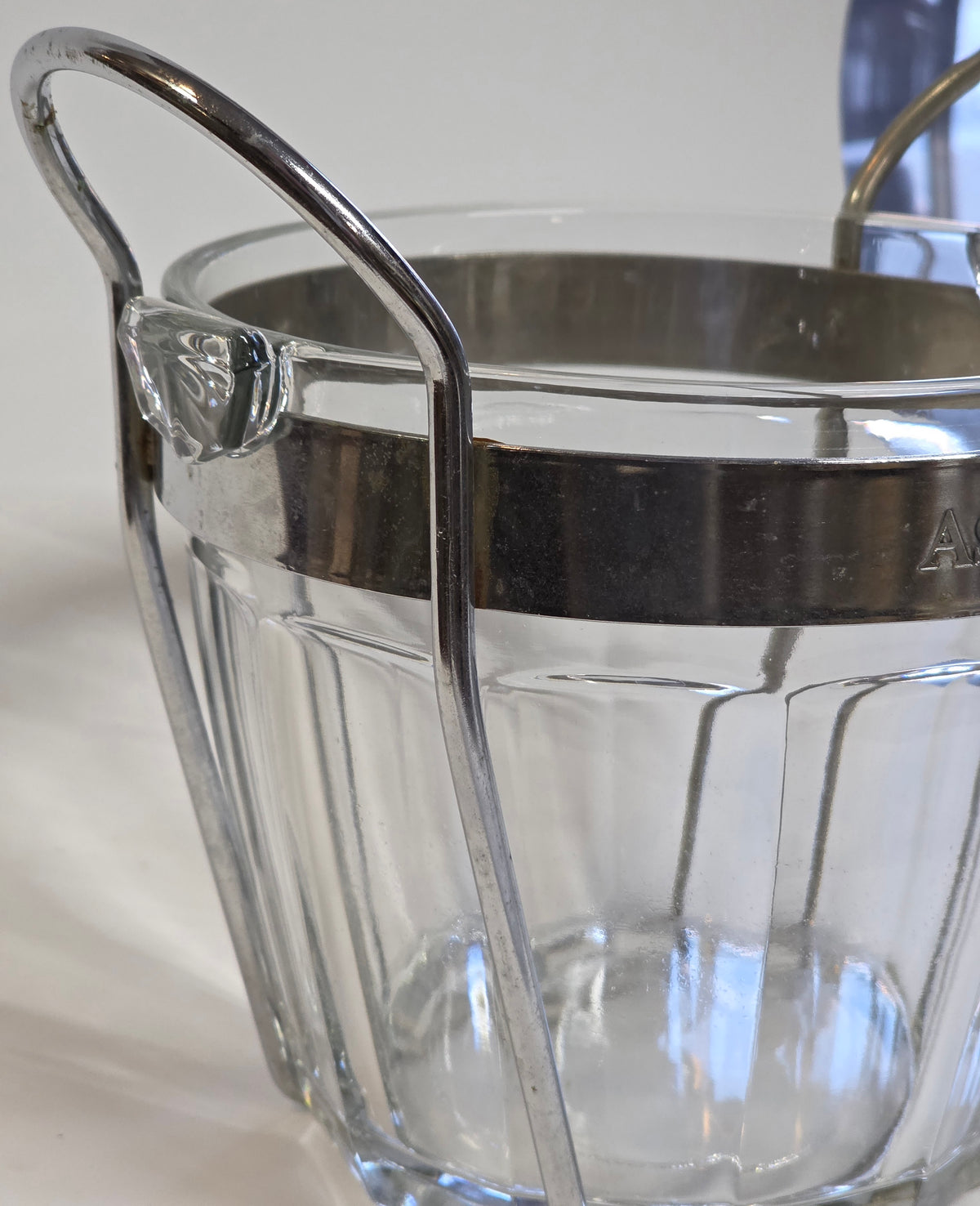 Glass ice tub in silver stand
