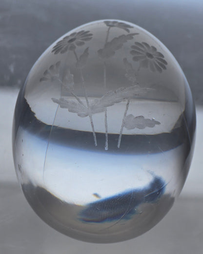 Glass egg paperweight with copper wheel engraved flowers