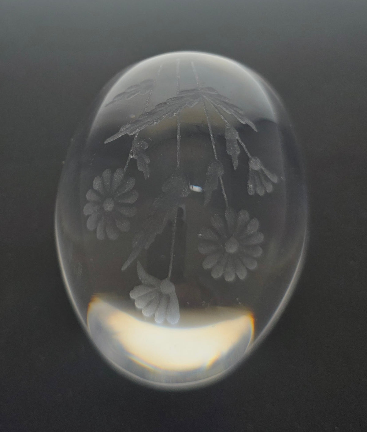 Glass egg paperweight with copper wheel engraved flowers