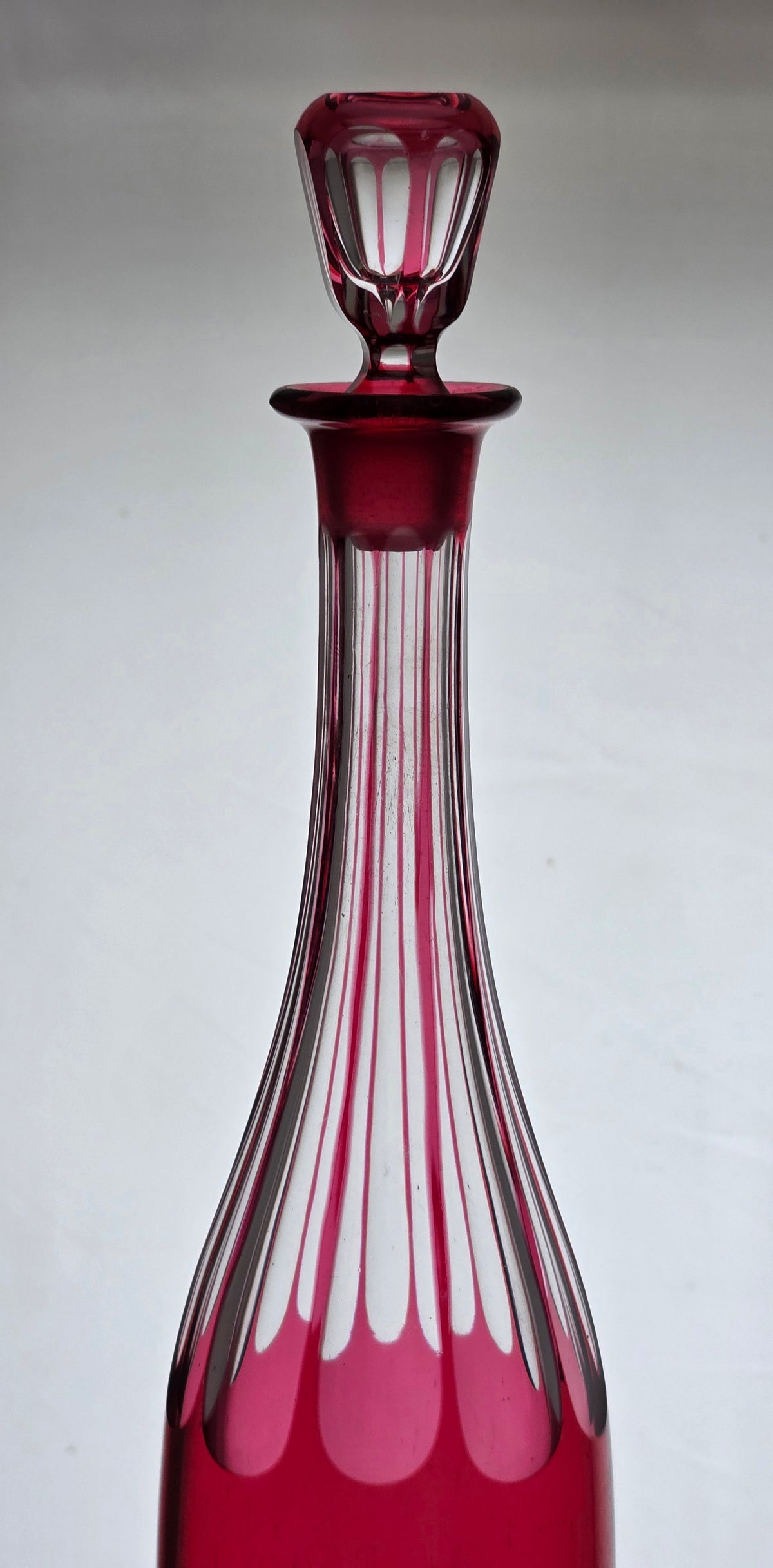 Hand Cut to clear cranberry decanter PA21