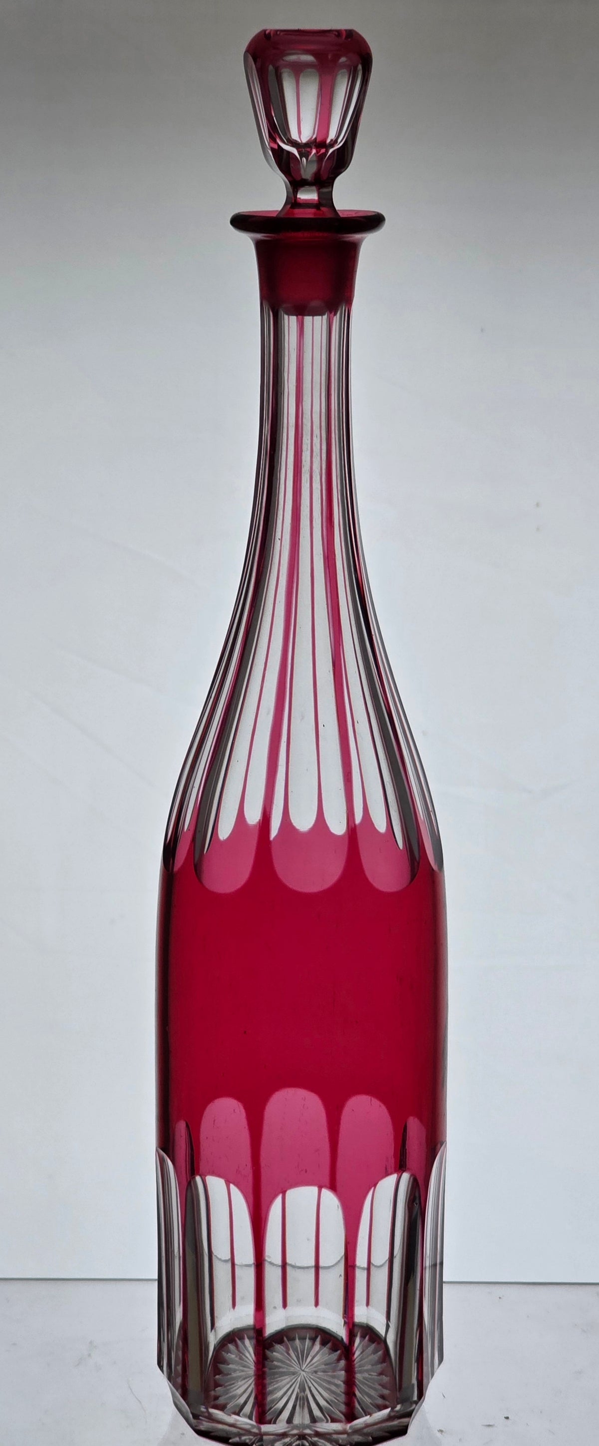 Hand Cut to clear cranberry decanter PA21