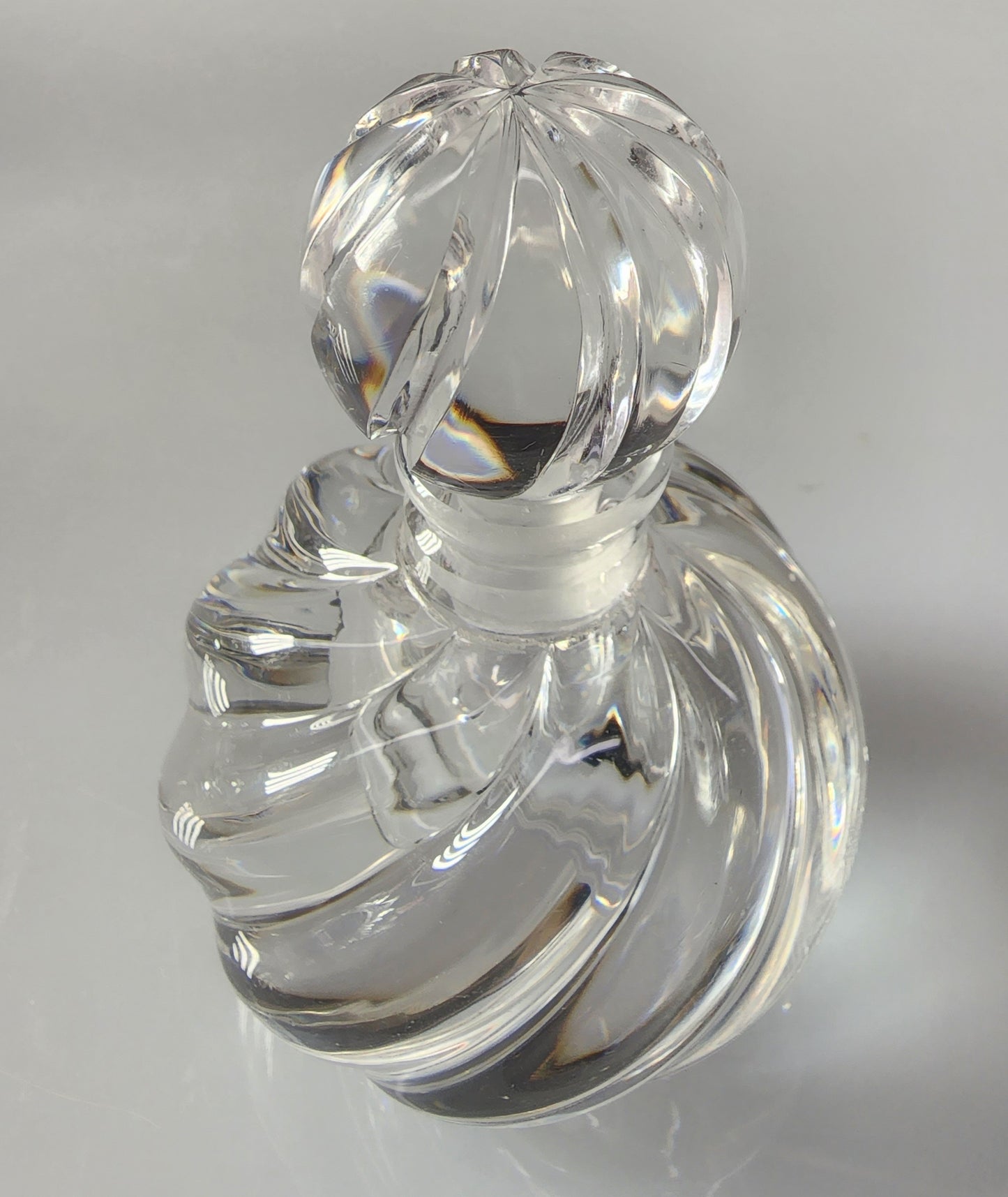 Glass perfume bottle swirl