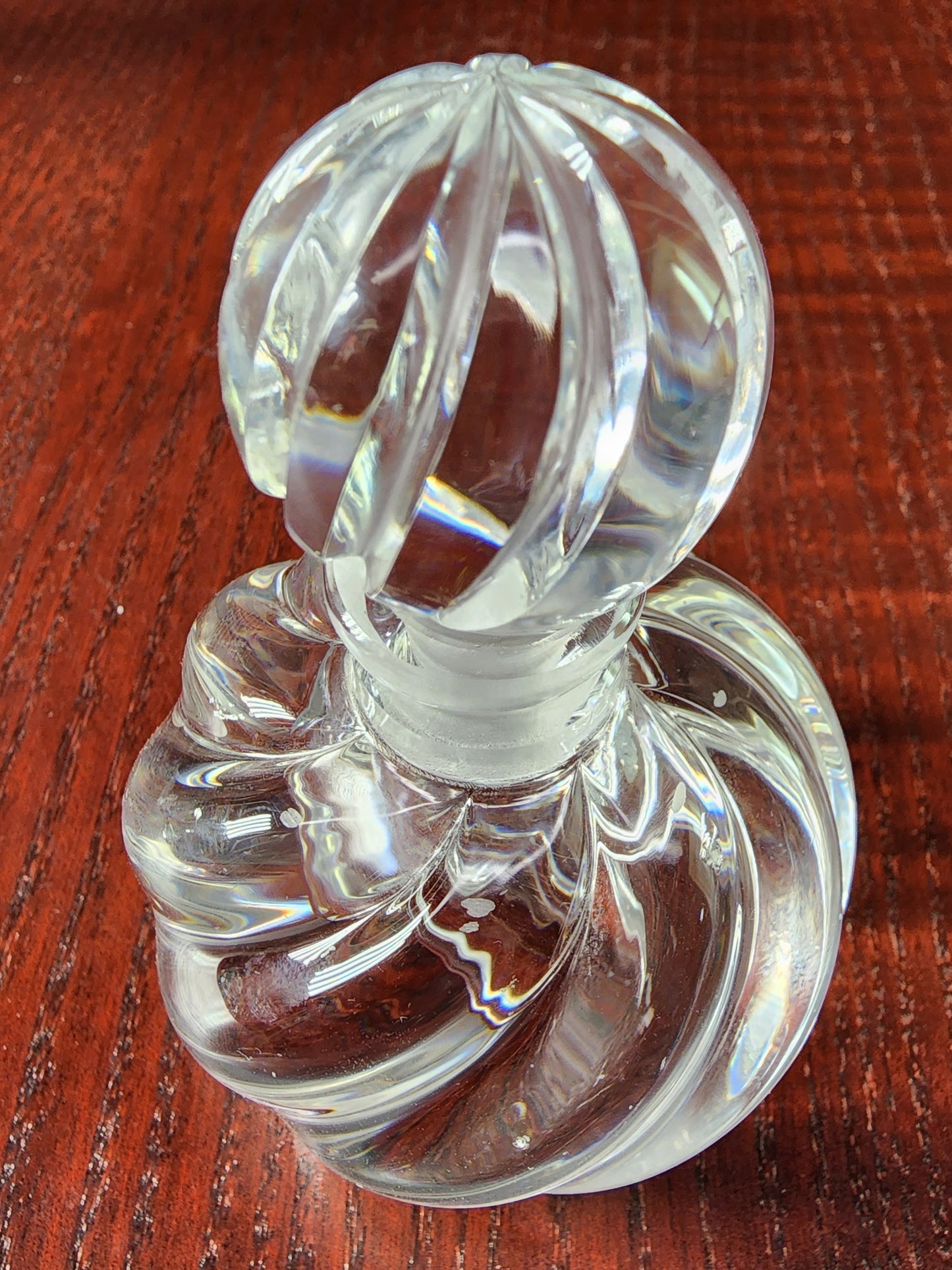 Glass perfume bottle swirl
