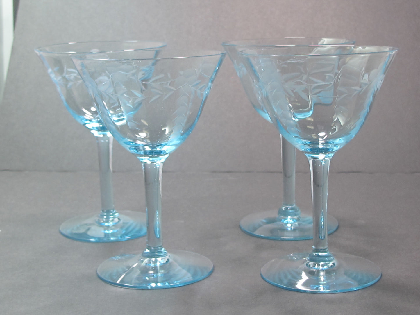 4 Hand cut glass cocktail glasses light blue